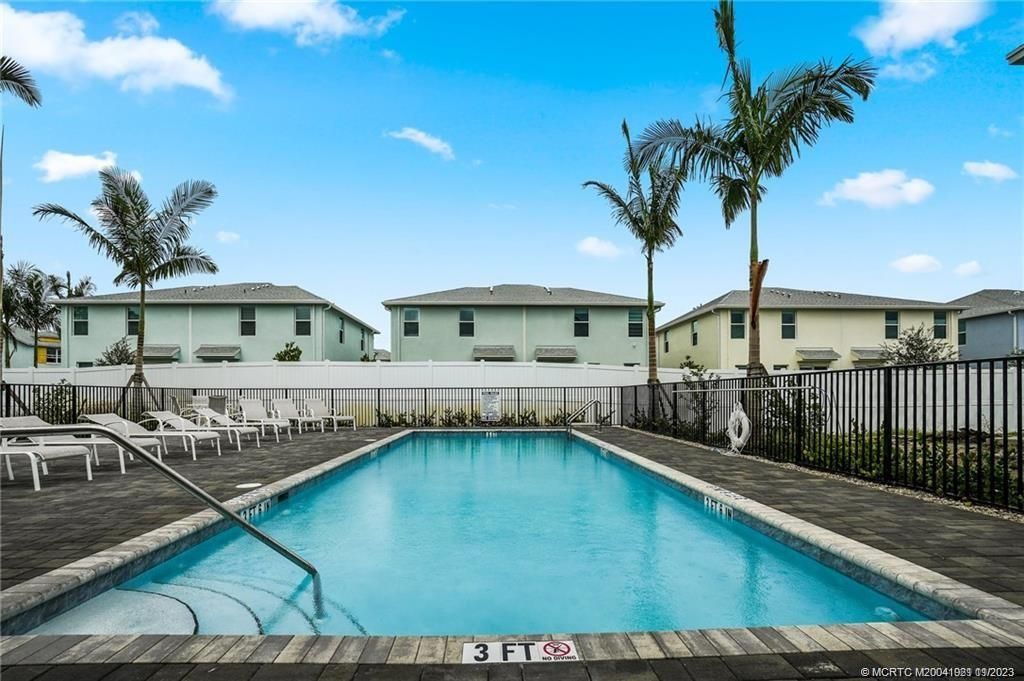 Photo of 211 Osprey Preserve Boulevard, Jensen Beach, FL 34957 (MLS # M20041921)