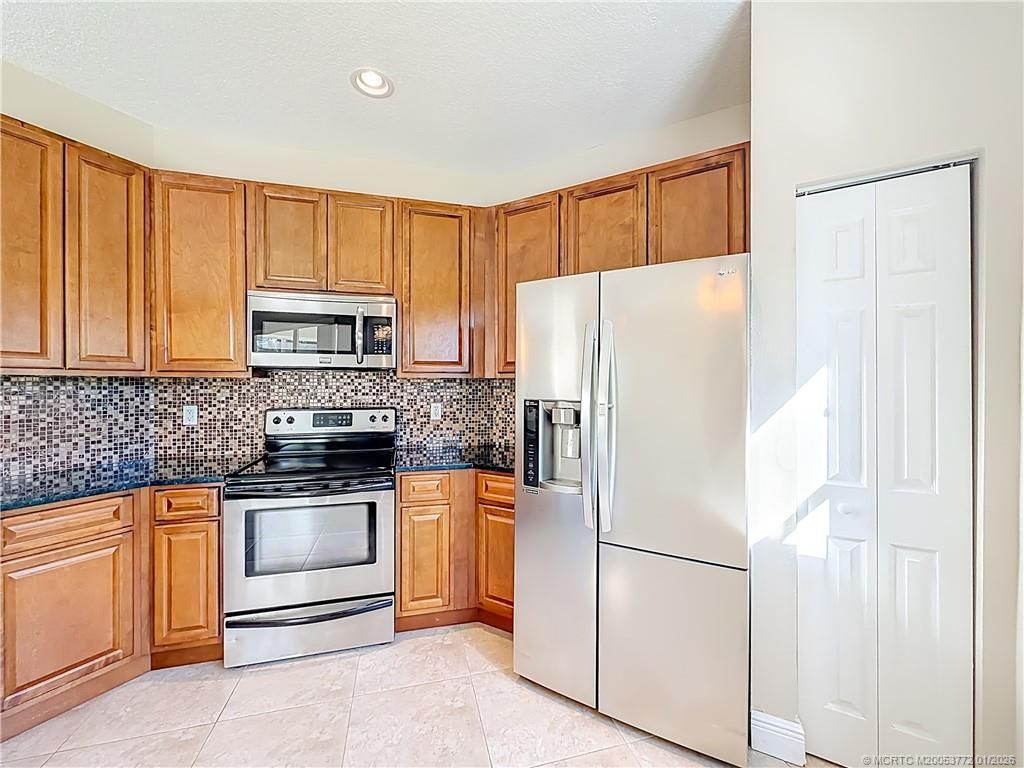 Photo of 211 SW Deleon Springs Drive, Port Saint Lucie, FL 34986 (MLS # M20053772)