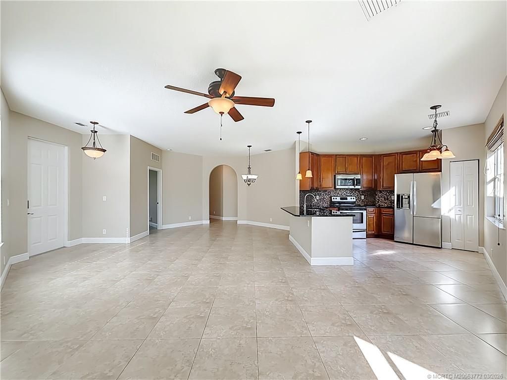 Photo of 211 SW Deleon Springs Drive, Port Saint Lucie, FL 34986 (MLS # M20053772)