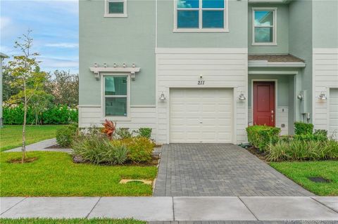 Photo of 211 SE Woodbark Street, Port Saint Lucie, FL 34984 (MLS # M20052600)