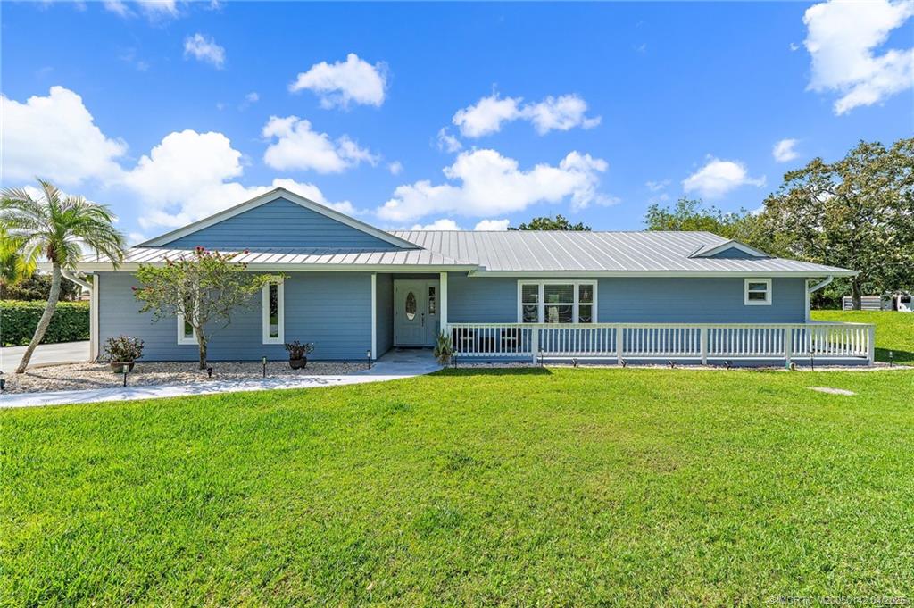 Photo of 3560 SW Racquet Club Way, Palm City, FL 34990 (MLS # M20050142)