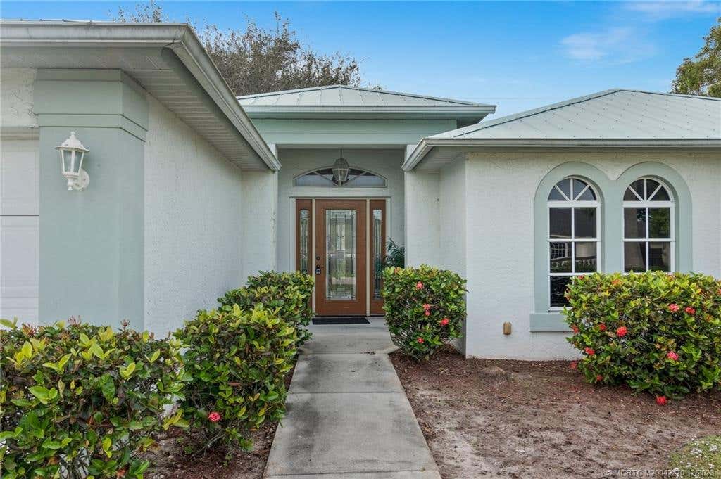 Photo of 1774 SE Gaskins Circle, Port Saint Lucie, FL 34952 (MLS # M20042270)