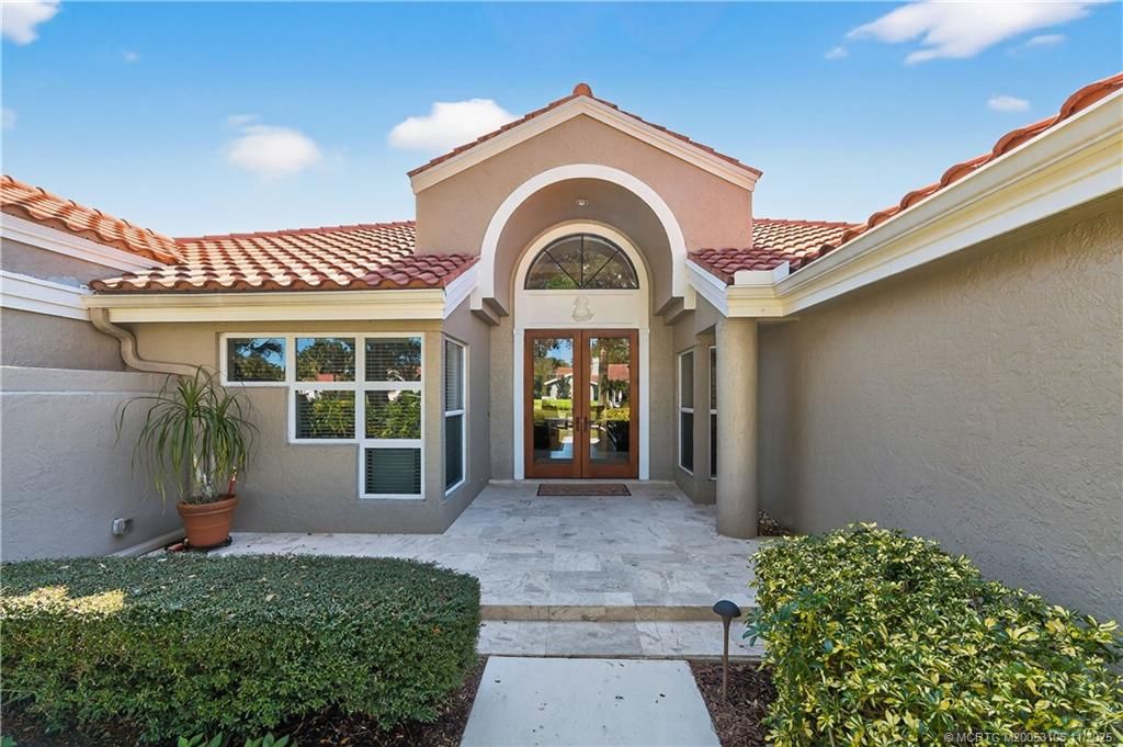 Photo of 2003 NW Laurel Oak Lane, Palm City, FL 34990 (MLS # M20053106)