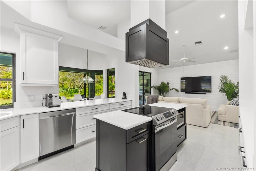 Photo of 1415 NW Winters Creek Road, Palm City, FL 34990 (MLS # M20038583)