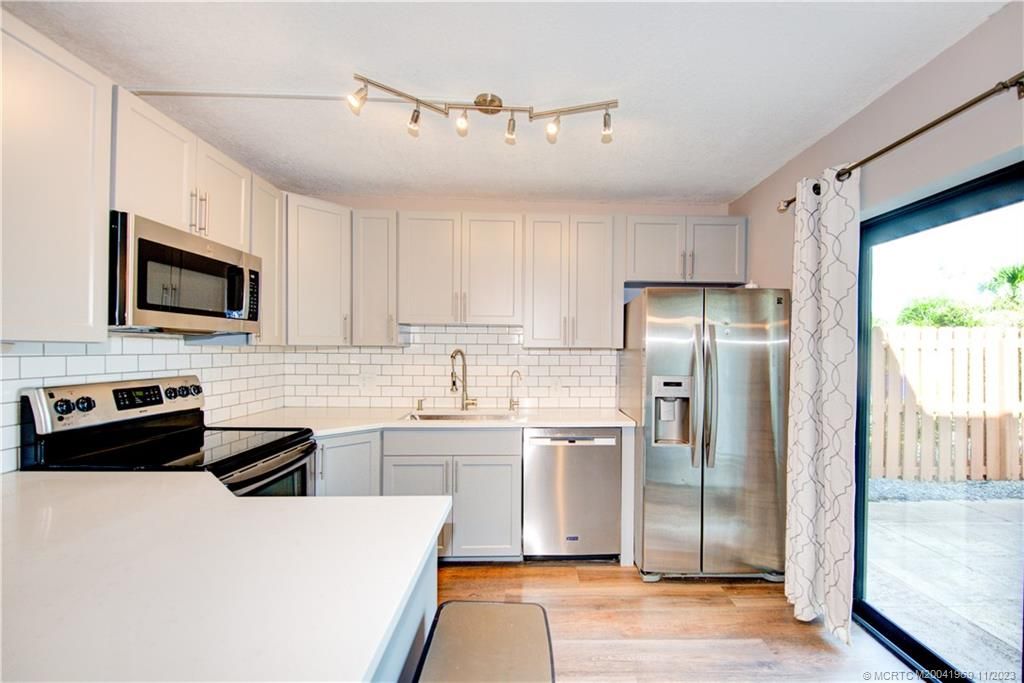 Photo of 5776 SE Riverboat Drive, Stuart, FL 34997 (MLS # M20041969)