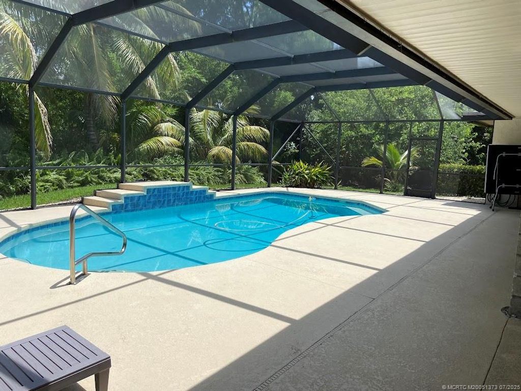 Photo of 94 NE Elderberry Terrace, Jensen Beach, FL 34957 (MLS # M20051373)