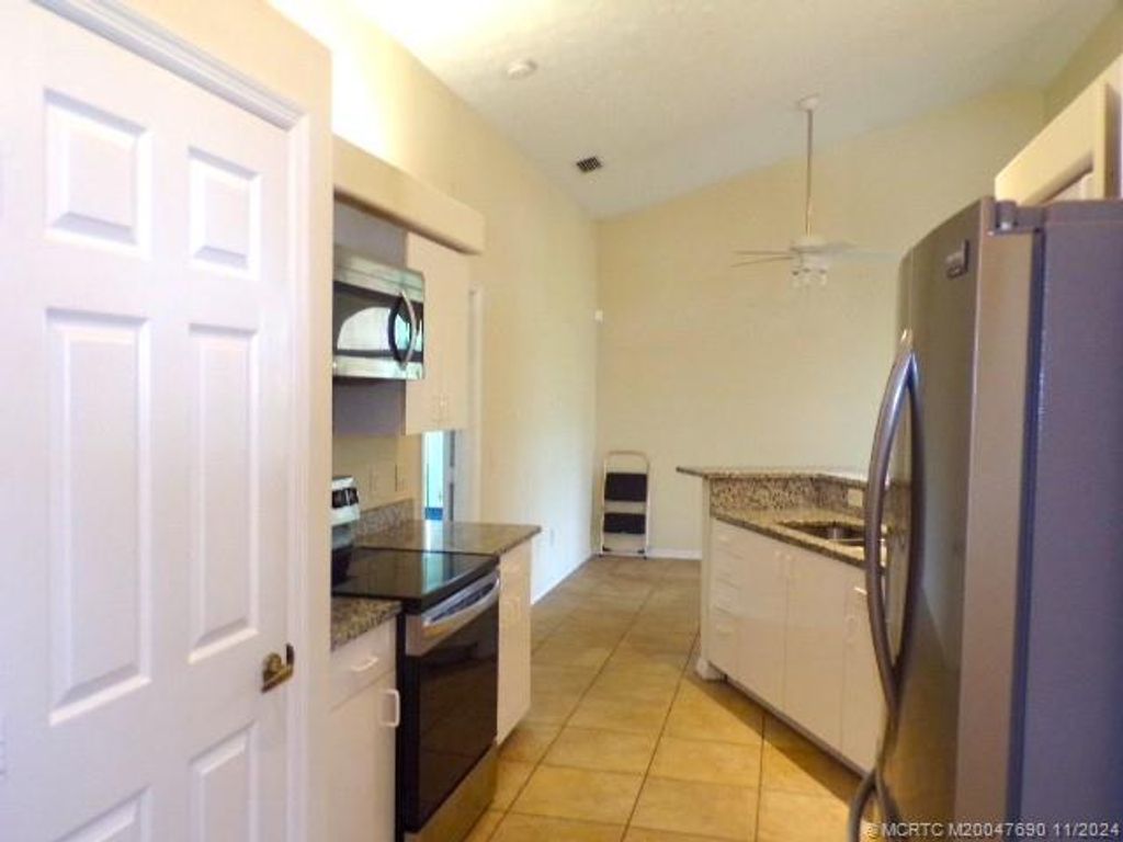 Photo of 4226 SW Jarmer Road, Port Saint Lucie, FL 34953 (MLS # M20047690)