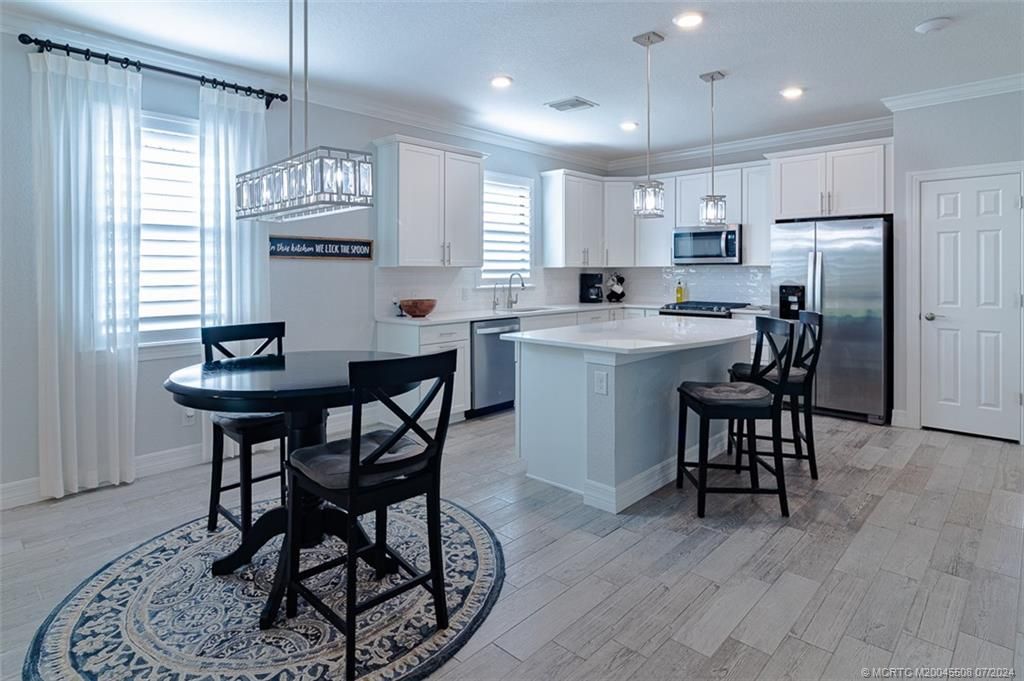 Photo of 827 SE Villandry Way, Port Saint Lucie, FL 34984 (MLS # M20045508)