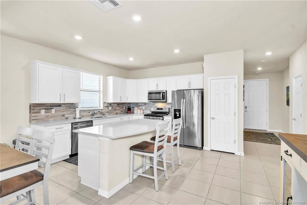 Photo of 479 SE Vallarta Drive, Port Saint Lucie, FL 34984 (MLS # M20054553)