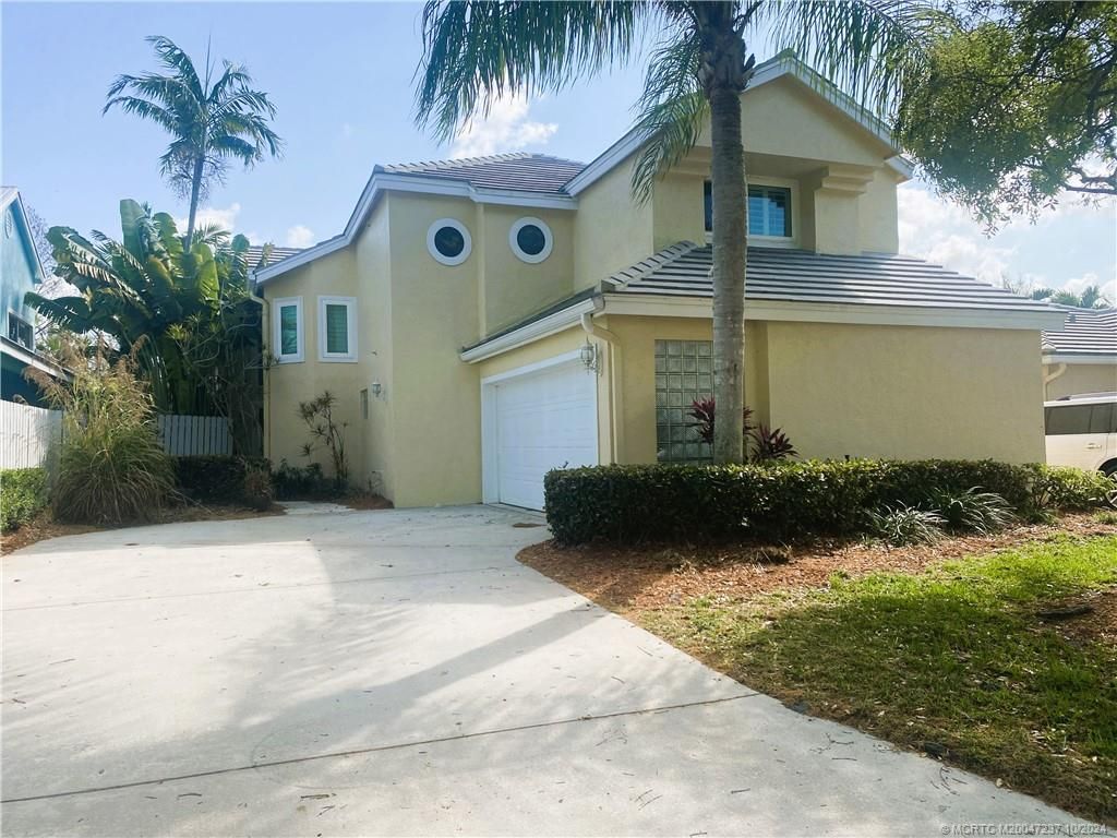 Photo of 3439 SW Pindo Palm Lane SW, Palm City, FL 34990 (MLS # M20047237)