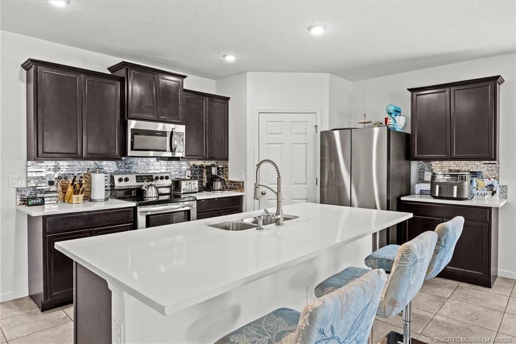 Photo of 1749 SW Alberca Lane, Port Saint Lucie, FL 34953 (MLS # M20055134)