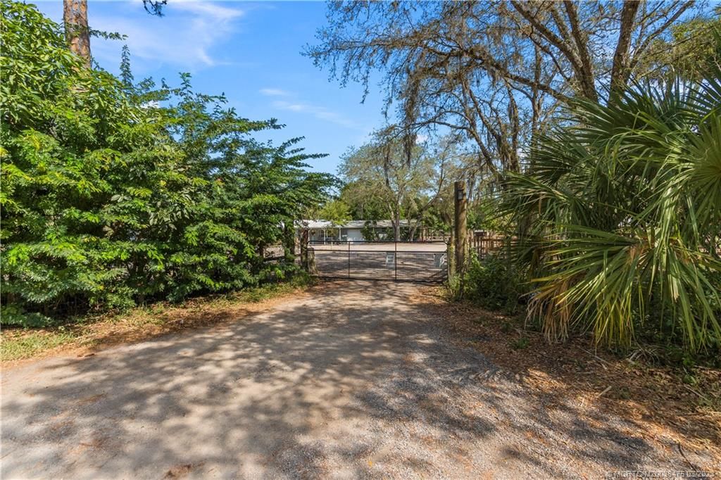 Photo of 4499 SW Cherokee Street, Palm City, FL 34990 (MLS # M20038475)