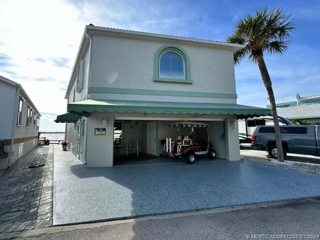 Photo of 52 Nettles Boulevard, Jensen Beach, FL 34957 (MLS # M20041222)