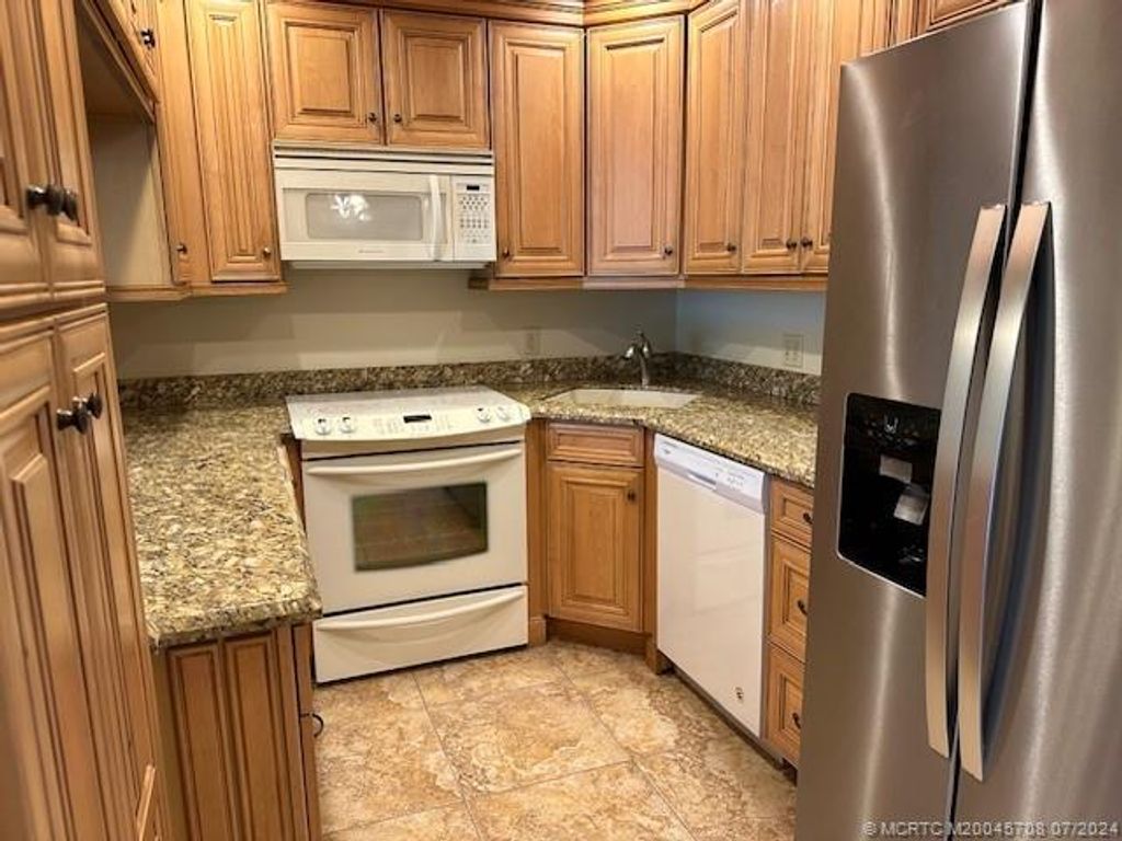 Photo of 1965 SW Silver Pine Way #G2, Palm City, FL 34990 (MLS # M20045708)