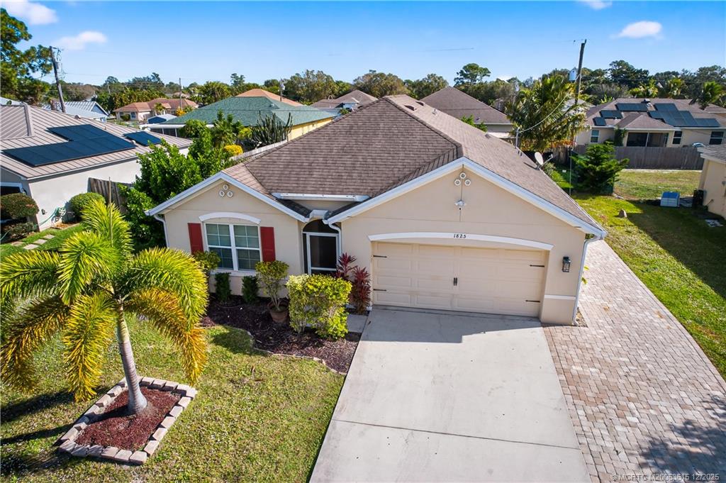 Photo of 1825 SW Davis Street, Port Saint Lucie, FL 34953 (MLS # M20053615)