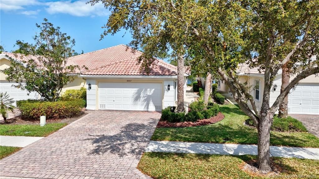 Photo of 8557 SE Retreat Drive, Hobe Sound, FL 33455 (MLS # M20047766)