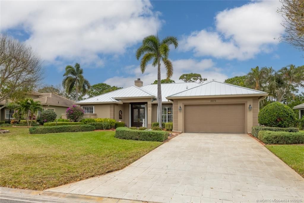 Photo of 2573 SW Holly Dale Way, Palm City, FL 34990 (MLS # M20048524)