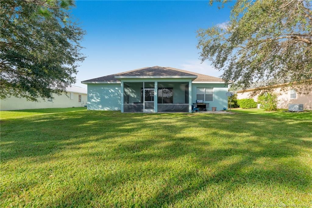 Photo of 5834 NW Windy Pines Lane, Port Saint Lucie, FL 34986 (MLS # M20041602)