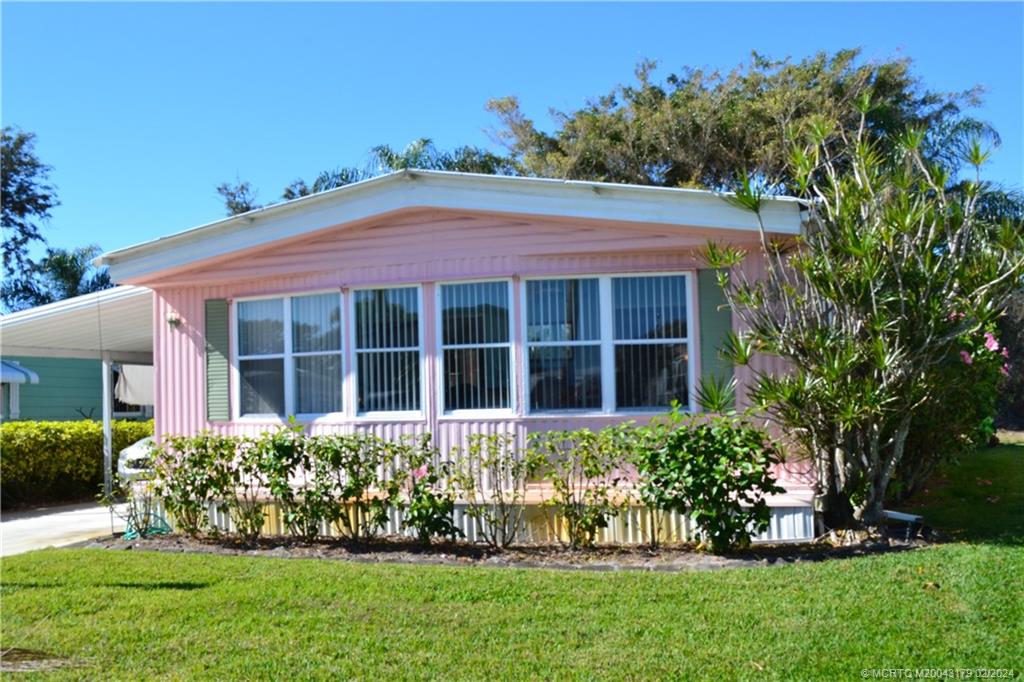 Photo of 88 S Warner Drive, Jensen Beach, FL 34957 (MLS # M20043179)