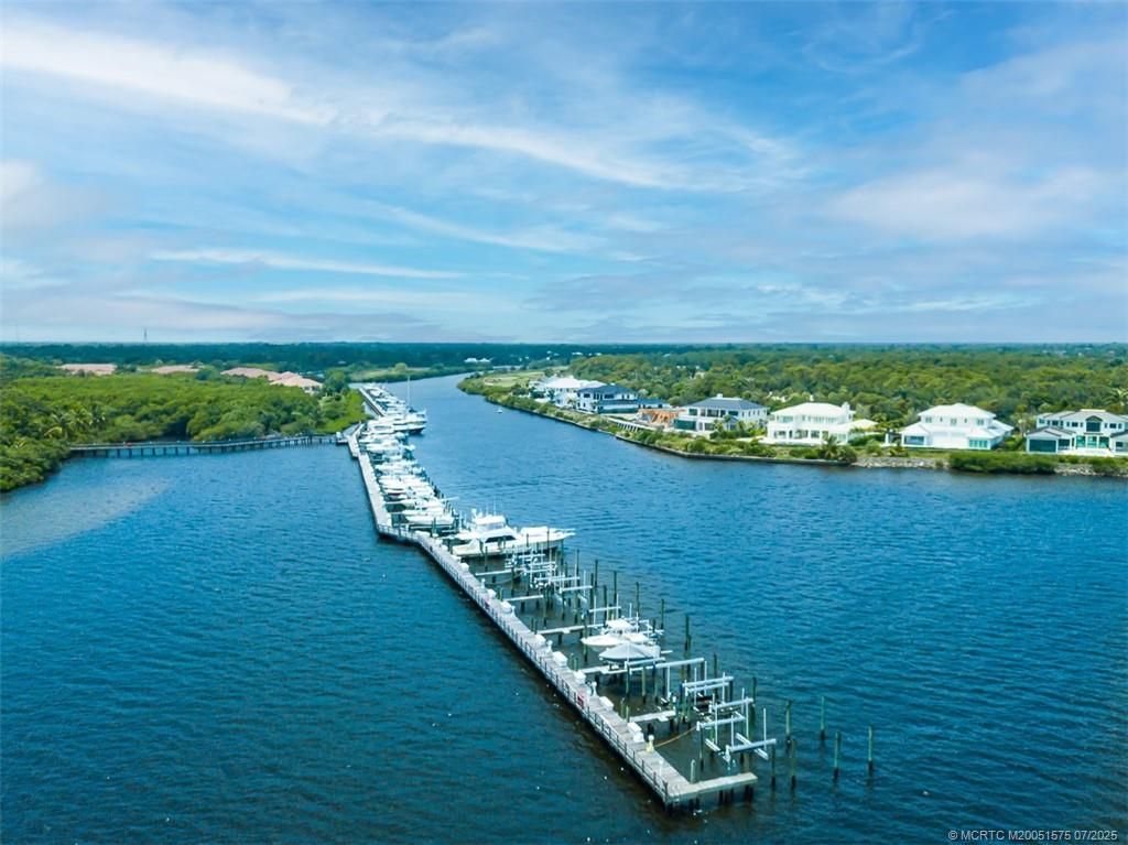 Photo of 2381 SW Island Creek Trail, Palm City, FL 34990 (MLS # M20051575)