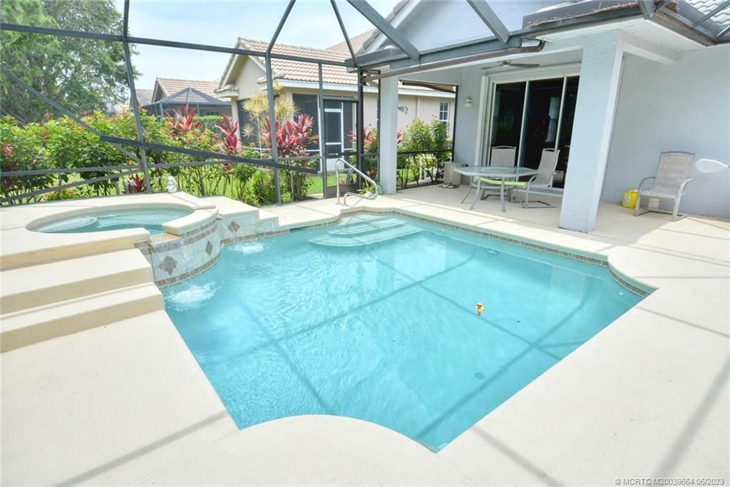 Photo of 730 NW Red Pine Way, Jensen Beach, FL 34957 (MLS # M20039664)