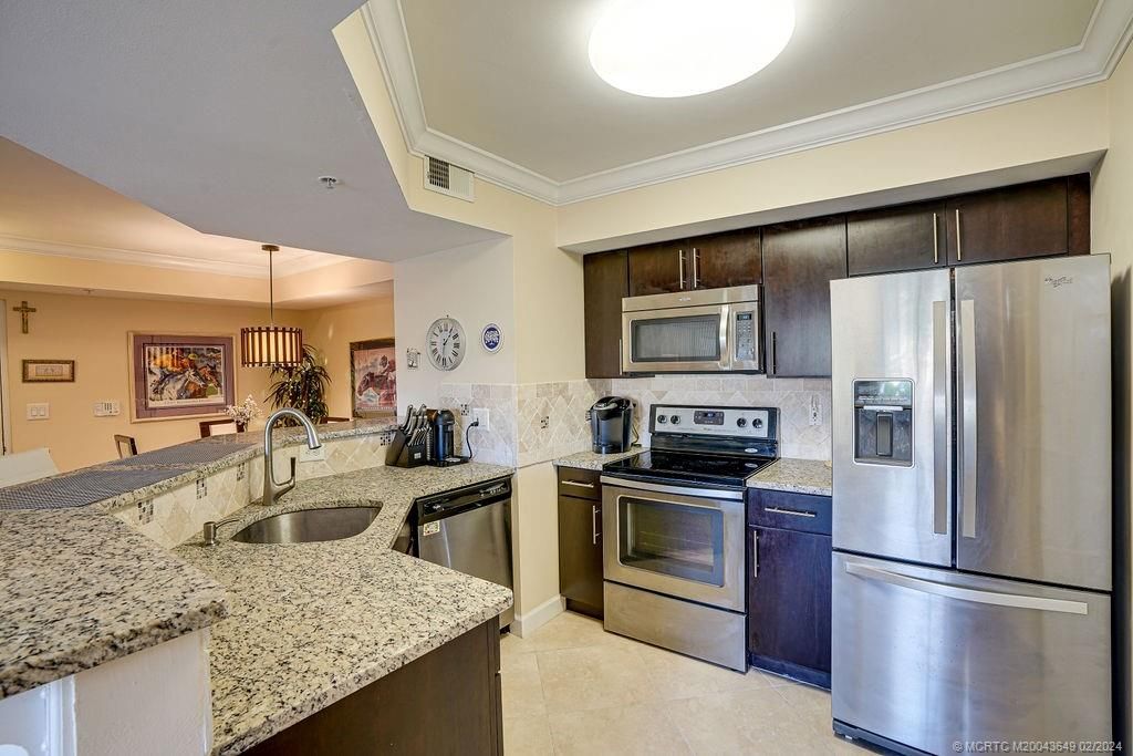Photo of 3678 NW Adriatic Lane #4-106, Jensen Beach, FL 34957 (MLS # M20043649)