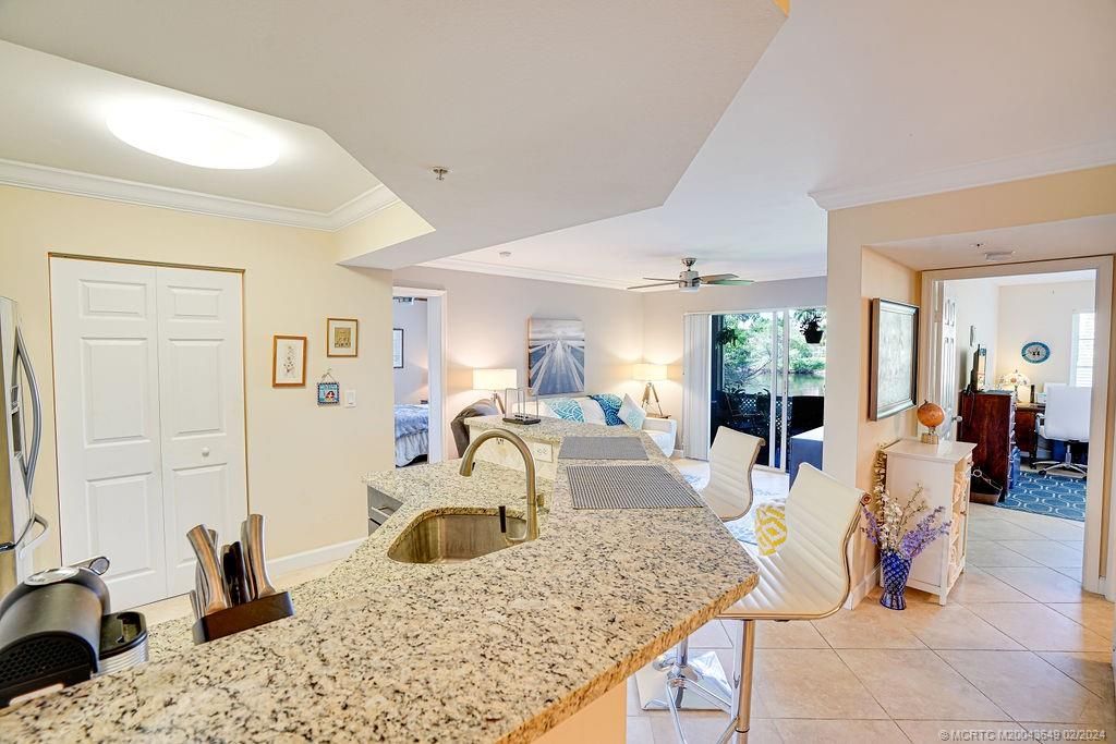 Photo of 3678 NW Adriatic Lane #4-106, Jensen Beach, FL 34957 (MLS # M20043649)