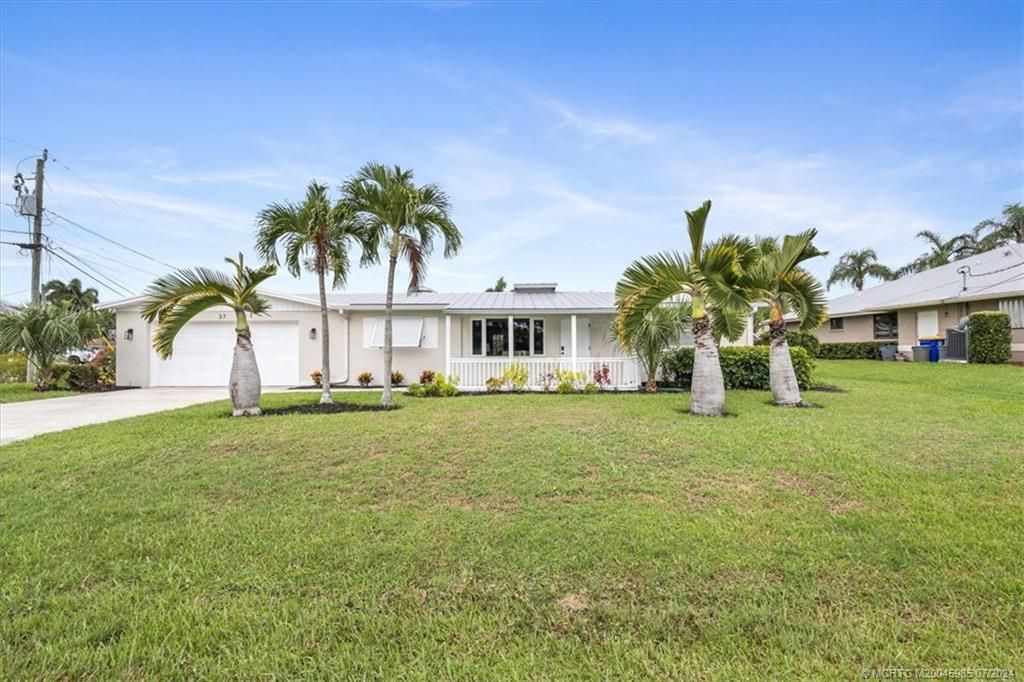 Photo of 37 SW Riverway Boulevard SW, Palm City, FL 34990 (MLS # M20045985)