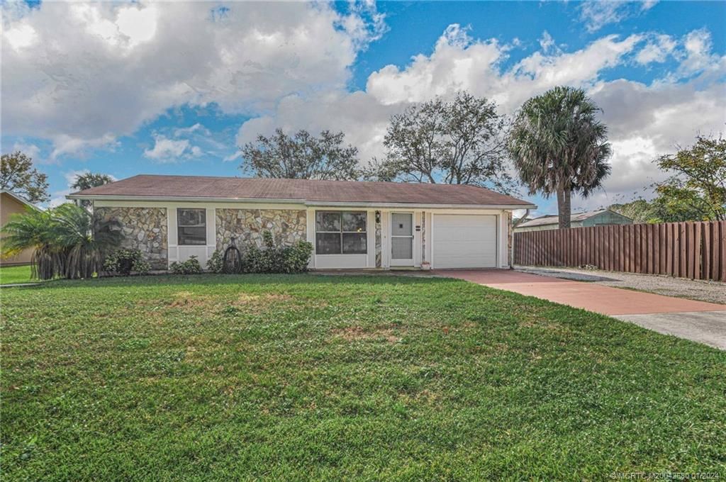 Photo of 626 NW Archer Avenue, Port Saint Lucie, FL 34983 (MLS # M20042680)