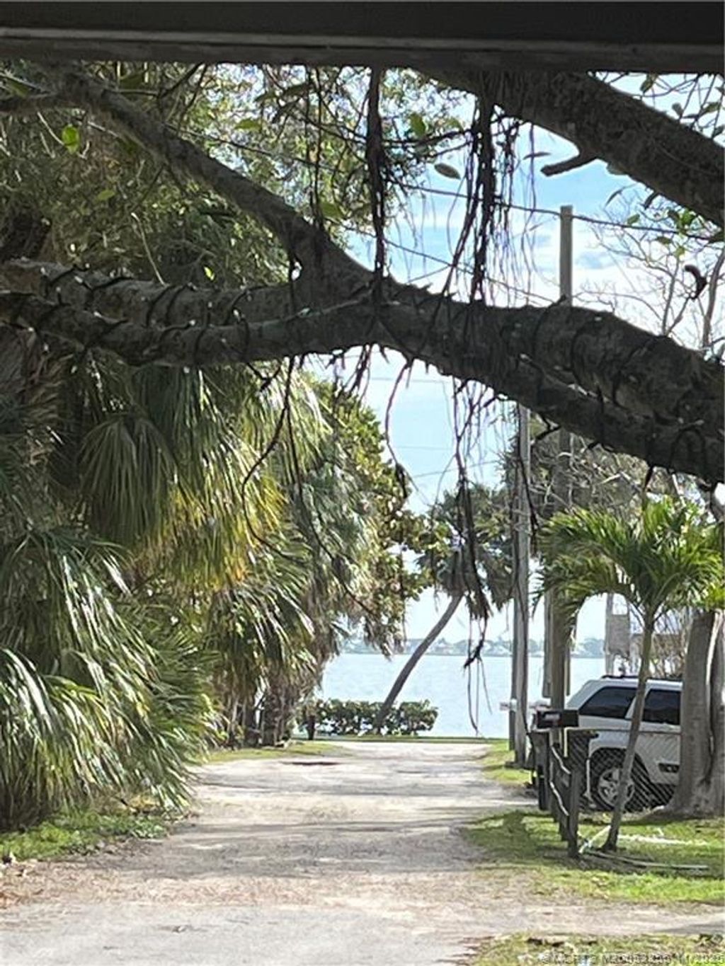 Photo of 2172 NE Poinciana Terrace, Jensen Beach, FL 34957 (MLS # M20053256)