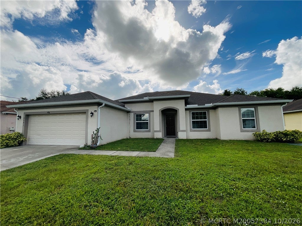 Photo of 4281 SW Carl Street, Port Saint Lucie, FL 34953 (MLS # M20057384)