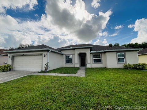 Photo of 4281 SW Carl Street, Port Saint Lucie, FL 34953 (MLS # M20057384)