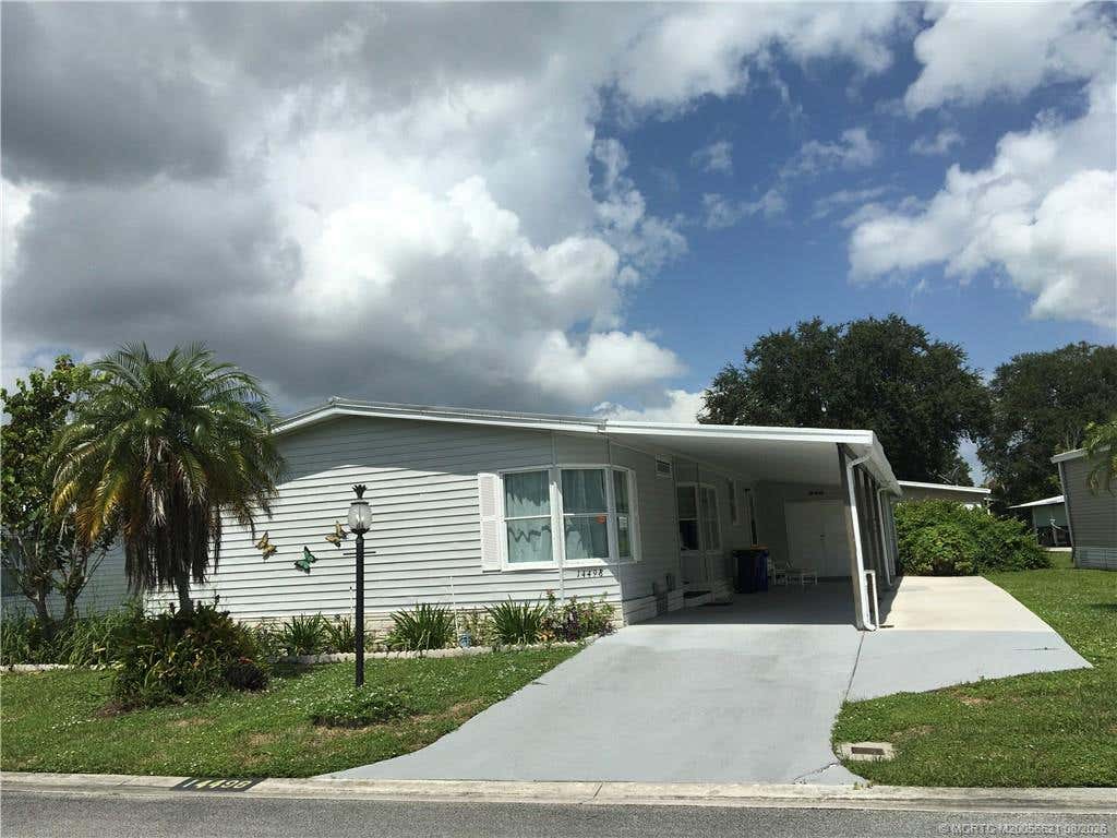 Photo of 14498 SW Golf Club Drive DR, Indiantown, FL 34956 (MLS # M20056621)