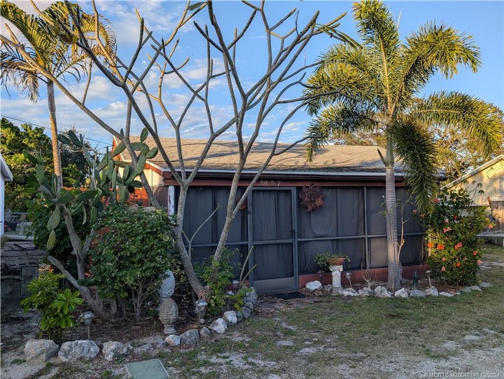 Photo of 2457 NE Hickory Avenue, Jensen Beach, FL 34957 (MLS # M20048149)