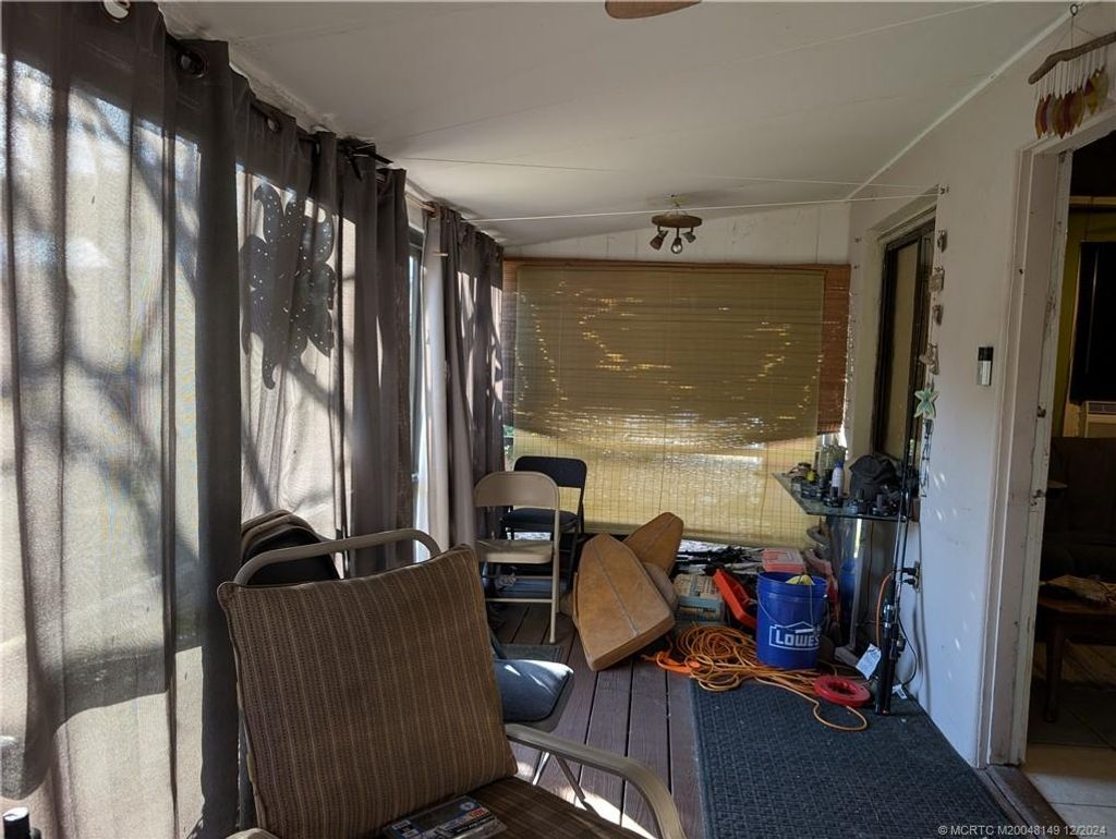 Photo of 2457 NE Hickory Avenue, Jensen Beach, FL 34957 (MLS # M20048149)