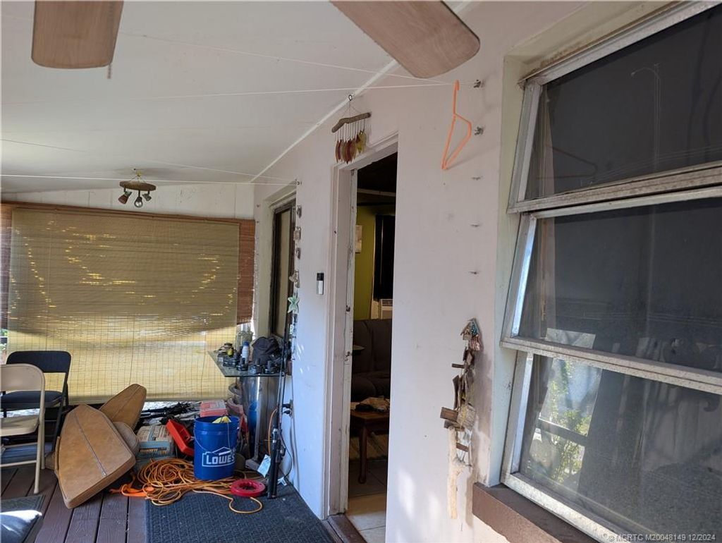 Photo of 2457 NE Hickory Avenue, Jensen Beach, FL 34957 (MLS # M20048149)