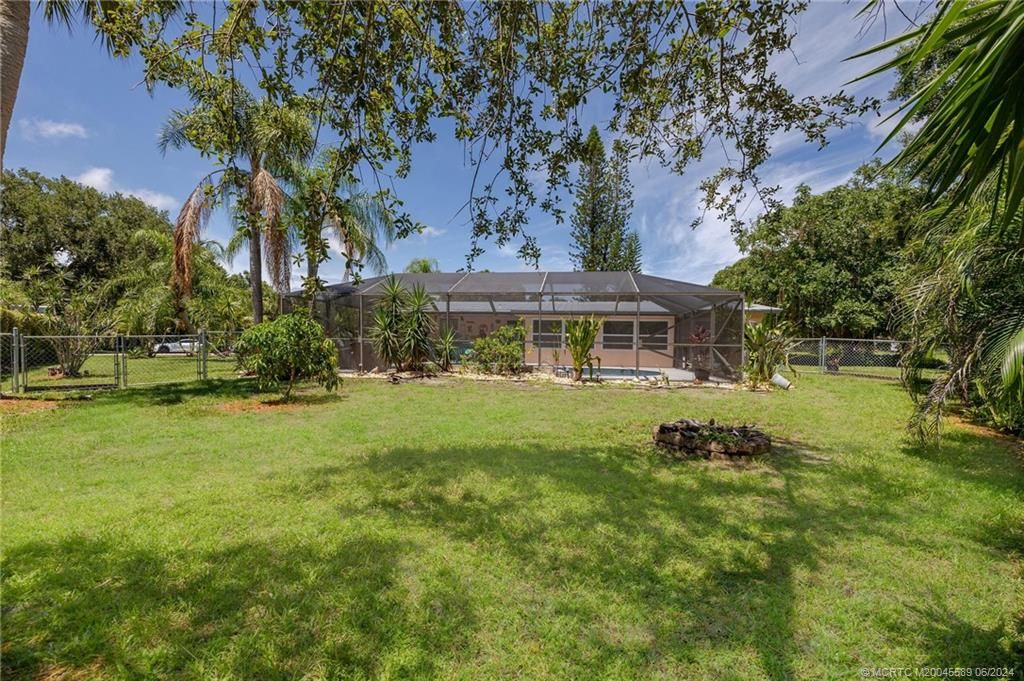 Photo of 5495 Mcdonnell Drive, Fort Pierce, FL 34951 (MLS # M20045589)