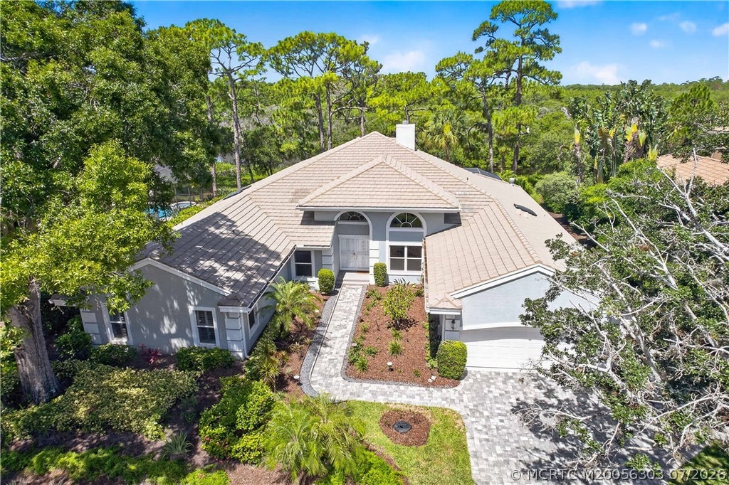Photo of 601 NW Winters Creek Road, Palm City, FL 34990 (MLS # M20056303)
