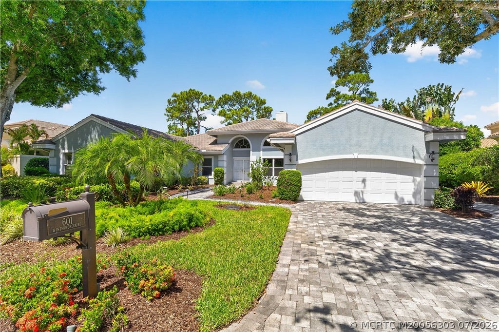 Photo of 601 NW Winters Creek Road, Palm City, FL 34990 (MLS # M20056303)