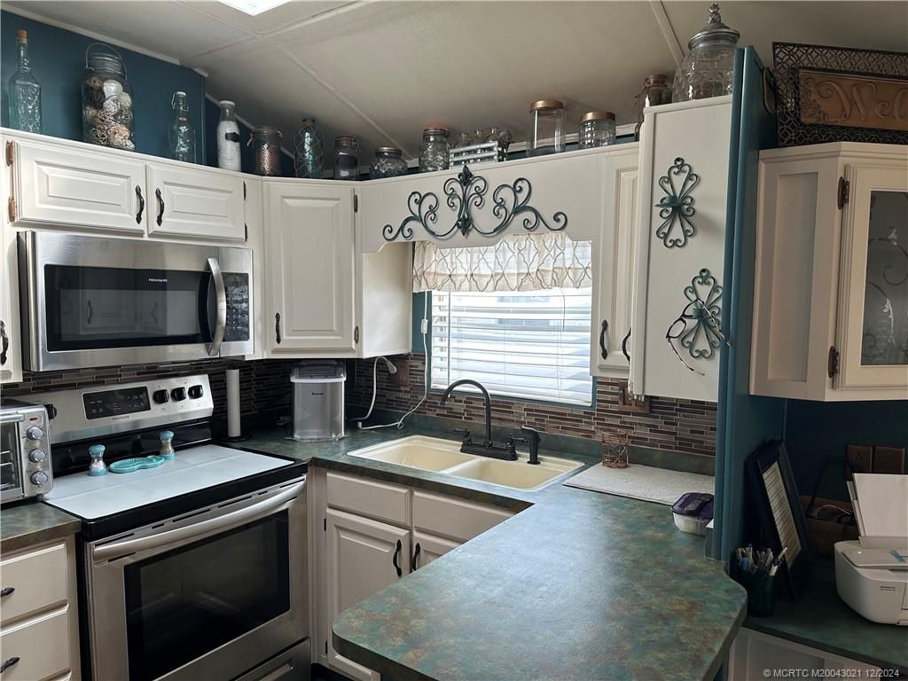 Photo of 1208 Nettles Boulevard, Jensen Beach, FL 34957 (MLS # M20043021)