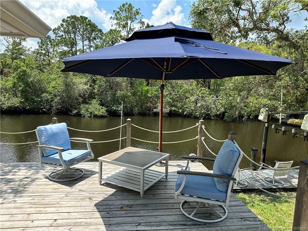 Photo of 8001 SE Paradise Drive, Stuart, FL 34997 (MLS # M20041833)