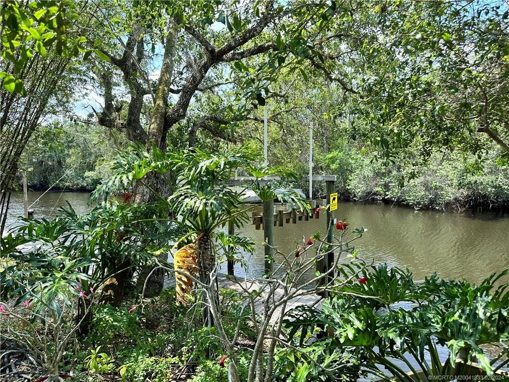 Photo of 8001 SE Paradise Drive, Stuart, FL 34997 (MLS # M20041833)