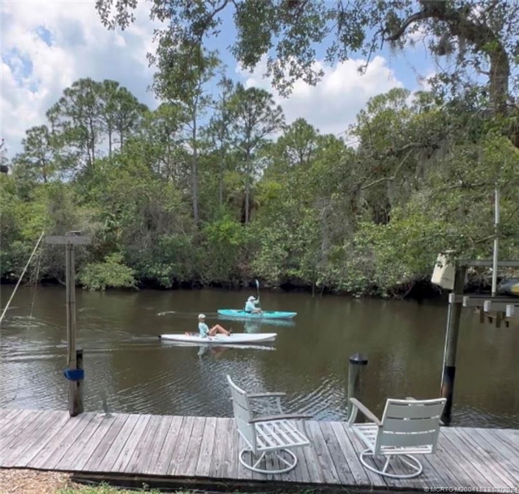 Photo of 8001 SE Paradise Drive, Stuart, FL 34997 (MLS # M20041833)