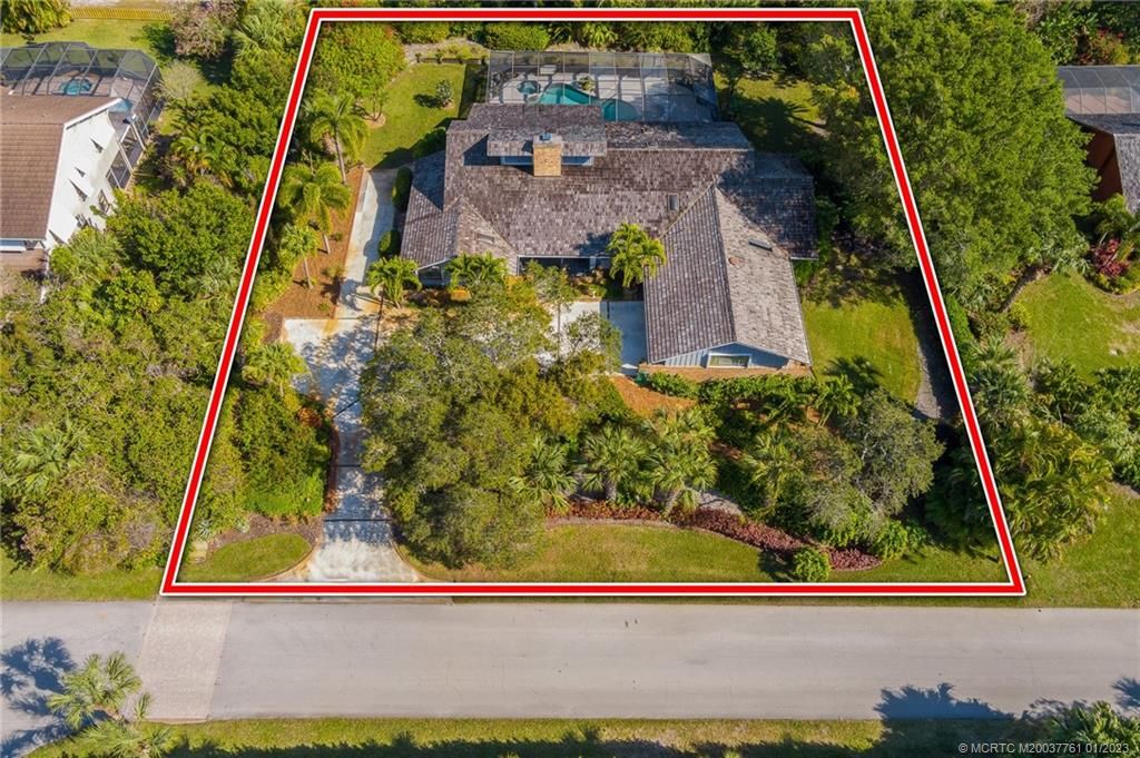 Photo of 3641 NE Sugarhill Avenue, Jensen Beach, FL 34957 (MLS # M20037761)