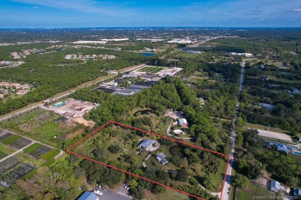 Photo of 5601 SW Sunshine Farms Way, Palm City, FL 34990 (MLS # M20053394)