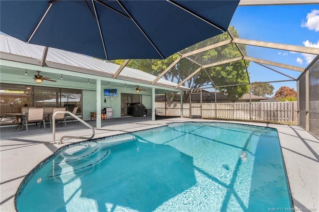 Photo of 3093 NE Ivy Lane, Jensen Beach, FL 34957 (MLS # M20054769)