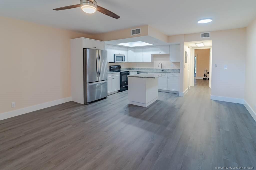Photo of 511 SW South River Drive #104, Stuart, FL 34997 (MLS # M20047647)