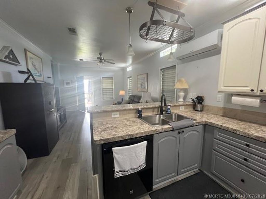 Photo of 2555 PGA Boulevard #180 A, Palm Beach Gardens, FL 33410 (MLS # M20056433)