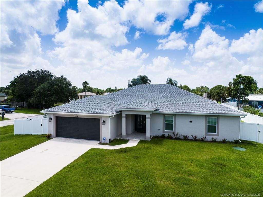 Photo of 1198 SW Hogan Street, Port Saint Lucie, FL 34983 (MLS # M20040743)