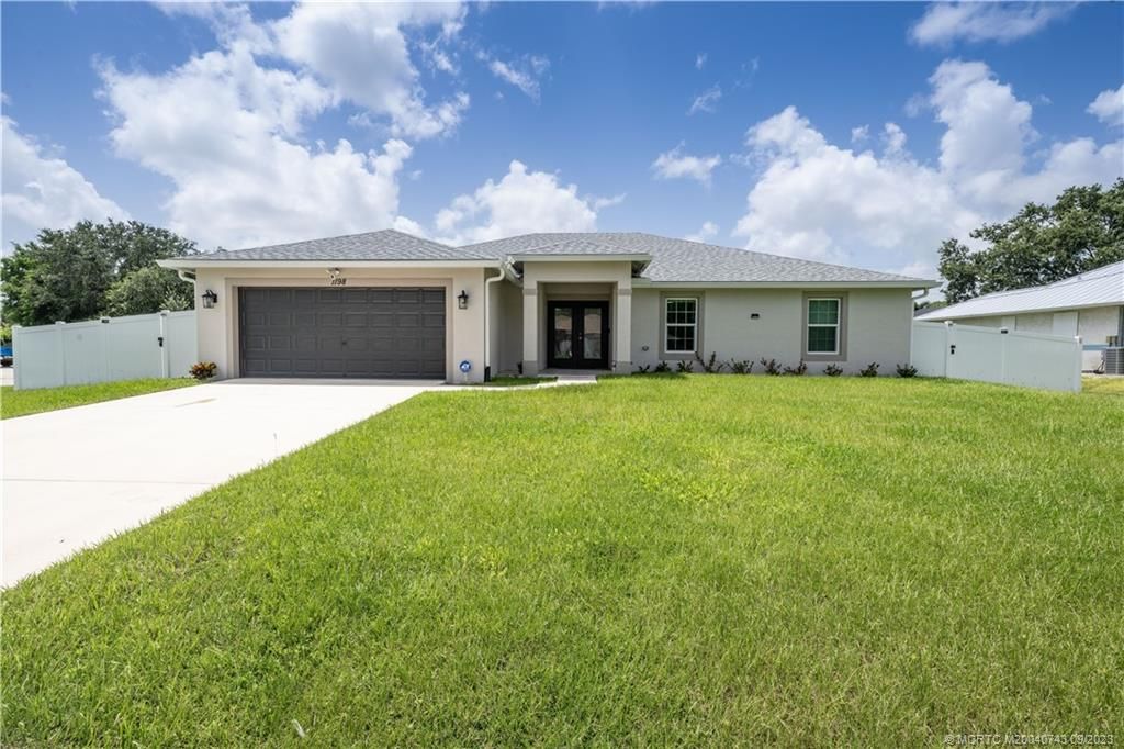Photo of 1198 SW Hogan Street, Port Saint Lucie, FL 34983 (MLS # M20040743)